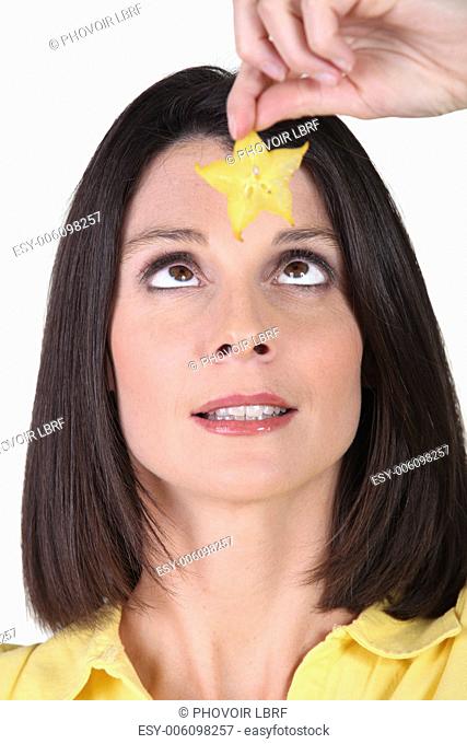 Woman holding a star