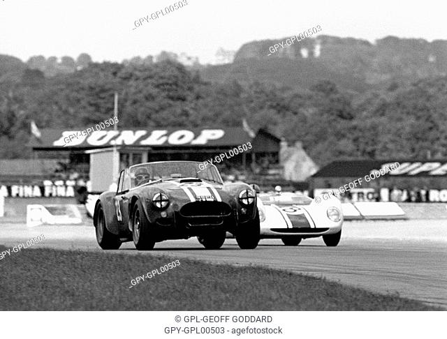 Goodwood. No23 Jack Sears' Willment Cobra, No 8 Denny Hulme's Brabham BT8 Climax in the Goodwood RAC TT, England 29th August 1964