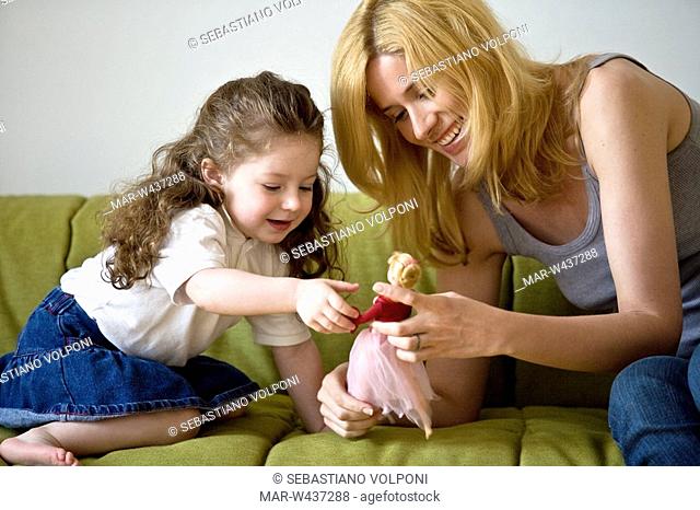 mother playing with her daughter