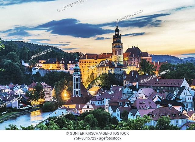View of the old town of Cesky Krumlov, the Castle Cesky Krumlov, St. Jost church and the River Vltava in Bohemia in the evening, Jihocesky Kraj, Czech Republic