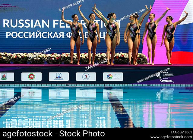 RUSSIA, KAZAN - DECEMBER 10, 2023: Members of Team Russia perform their group technical routine during the Synchronised Swimming Federation Cup at the Palace of...