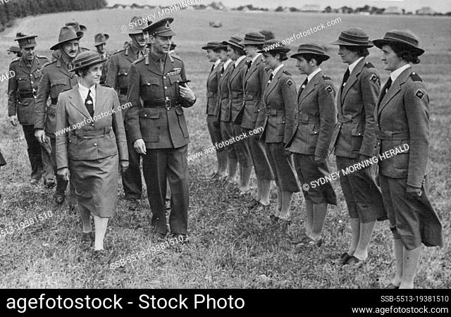 H.M. The King visits Australian Troops in The South of England - The King inspecting Australian voluntary nurses. August 28, 1940