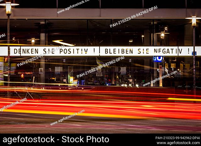 23 March 2021, Lower Saxony, Hanover: The writing ""Think positive! Stay negative!"" can be read above the entrance area of the ""Theater am Aegi""