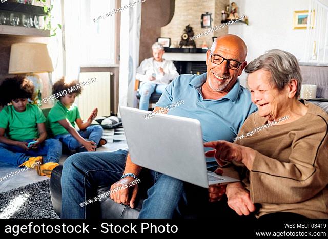 Multi-ethnic family spending leisure time at home