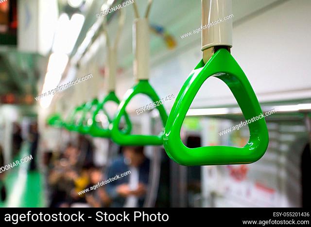 A handle for passengers in a Seoul subway train carriage