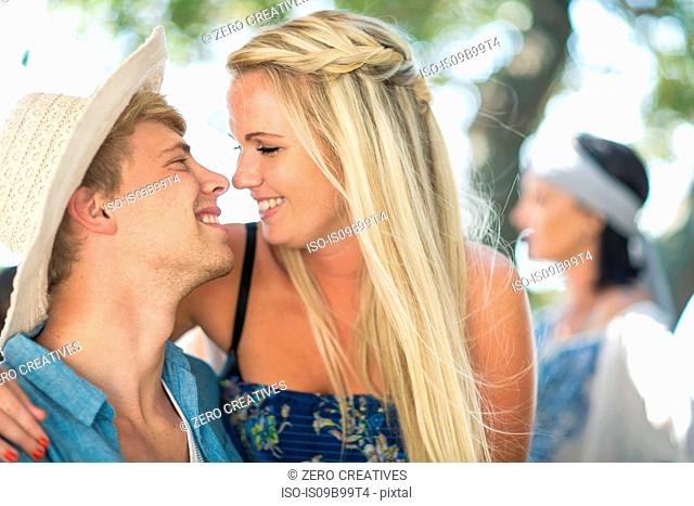 Romantic young couple at beach party