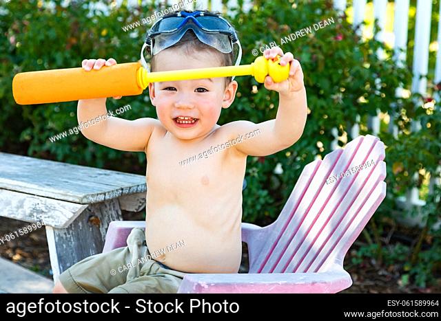 Happy Playful Young Mixed Race Chinese and Caucasian Boy Wearing Swimming Goggles