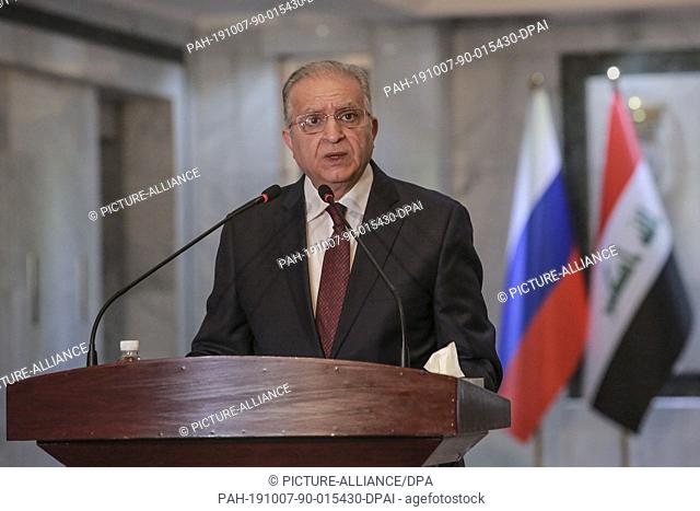07 October 2019, Iraq, Baghdad: Iraqi Foreign Minister Mohamed Ali Alhakim speaks during a press conference with Russian Foreign Minister Sergey Lavrov (not...