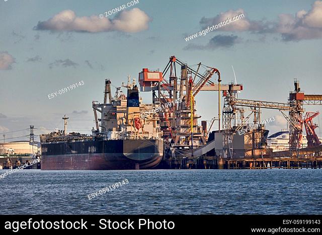 Cargo ship in an industrial dock