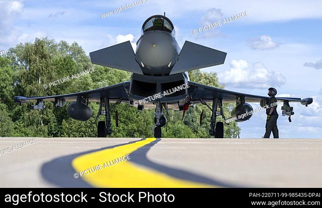 11 July 2022, Mecklemburg-Western Pomerania, Laage: A Eurofighter Typhoon fighter aircraft stands after landing at Rostock-Laage Airport