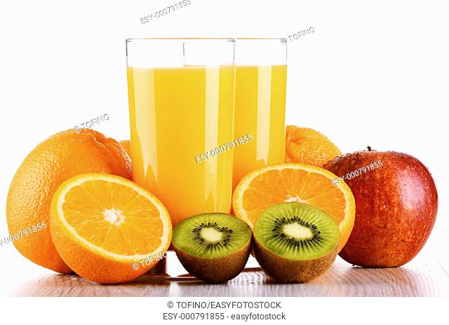 Glasses of orange juice and fruits isolated on white