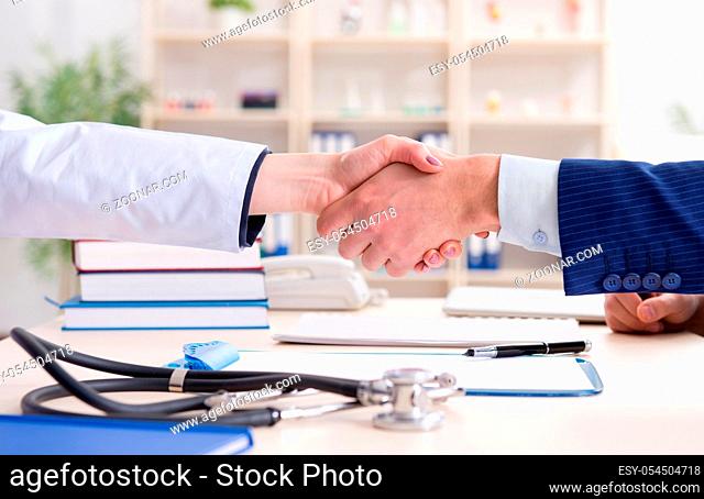 The man signing medical insurance contract