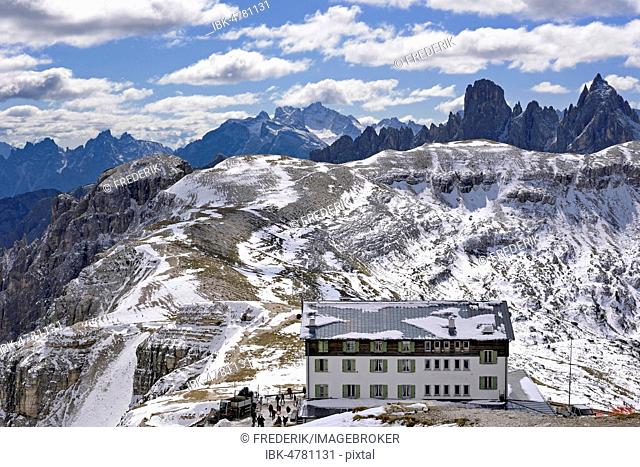 View to the Auronzo mountain hut 2320 m below the Three Peaks of Lavaredo south walls, Sexten Dolomites, South Tyrol, Alto-Adige, Italy