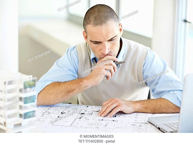 Architect working in office