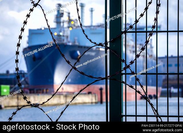14 January 2023, Mecklenburg-Western Pomerania, Lubmin: The processing ship ""Neptune"" is moored in the industrial port at the LNG terminal