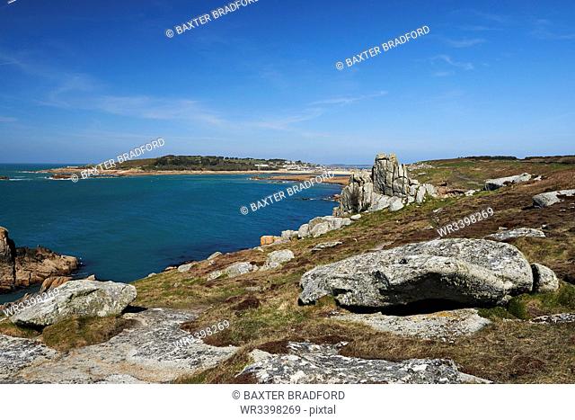 Granite rocks on a headland near Old Town, looking at Samsom, St. Mary's, Isles of Scilly, England, United Kingdom, Europe