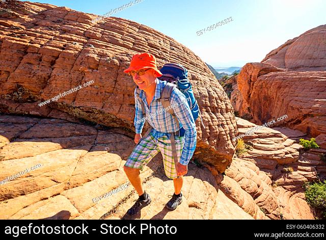 Hike in the Utah mountains. Hiking in unusual natural landscapes. Fantastic forms sandstone formations