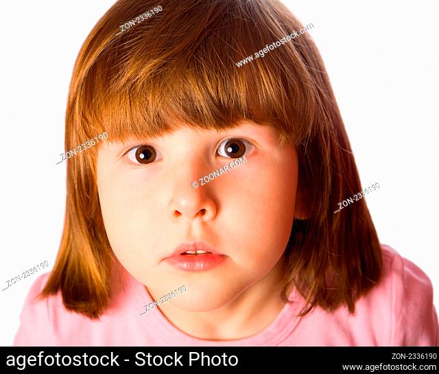Studio portrait of a curious shy little girl isolated on white