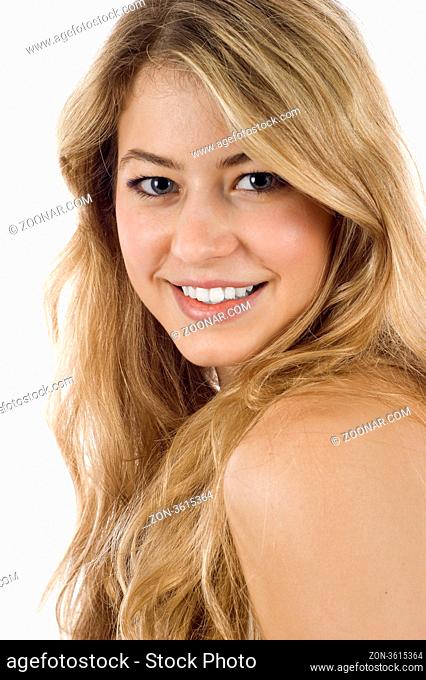 Smiling woman looking over her shoulder at camera isolated over white background