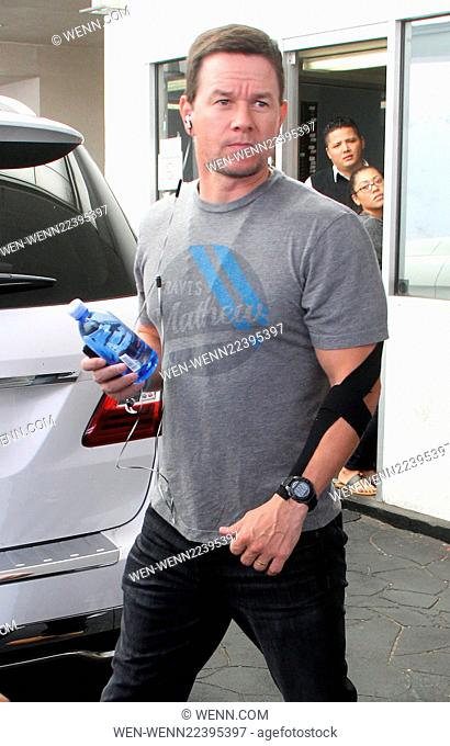 Mark Wahlberg leaves E Baldi n Beverly Hills wearing a Kinesiology Tape on his left arm Featuring: Mark Wahlberg Where: Los Angeles, California
