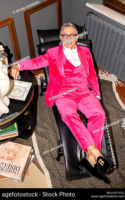 Italian chef Bruno Barbieri, portrayed at showroom of the italian designer Gabriele Pasini, wears the fluo fuchsia smooth velvet suit used for the final of the...