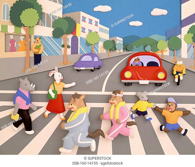 Animals are crossing a pedestrian crossing
