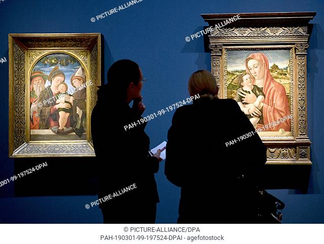 01 March 2019, Berlin: Visitors can see the paintings ""Madonna with Child"" by Giovanni Bellini (r) and ""Madonna with Child and Saints Jerome and Louis of...