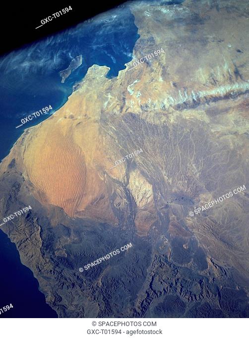 Wahibah Sands in eastern Oman is a small coastal sand desert that borders the Arabian Sea. The desert demonstrates the results of erosion and deposits caused by...