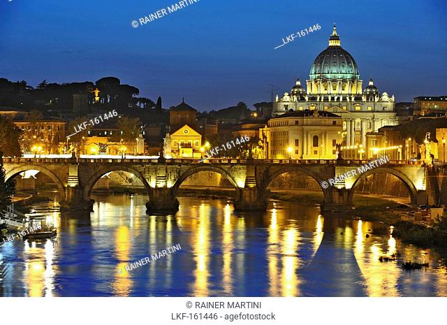 Ponte Sant'Angelo at dusk, with St. Peter's Basilica in the background, Rome, Italy