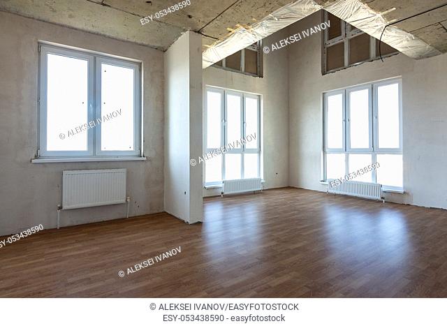 Interior of a two-story spacious room in the apartment