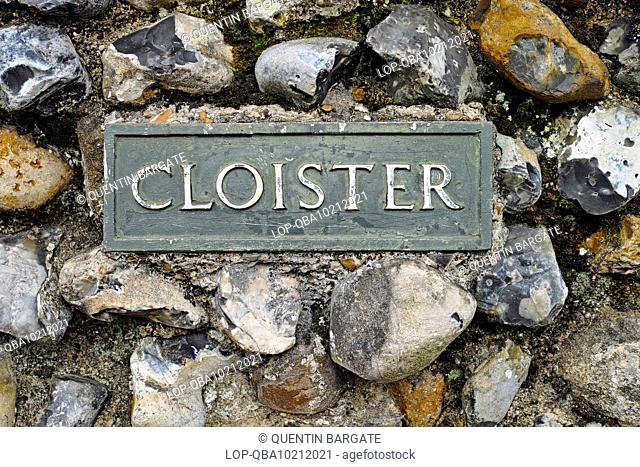 Cloister sign in the gardens by St Edmunsdbury Cathedral