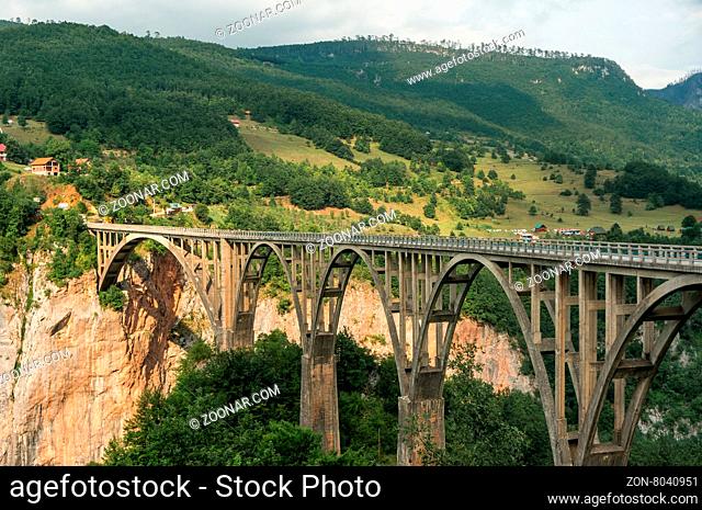 Old big bridge in Durdevica and fantastic view Tara river gorge - is the biggest one canyon in Europe in the national park Durmitor, Montenegro