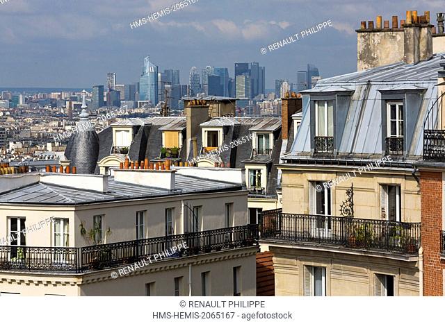 France, Paris, the city view from the heights of Montmartre, in the background the towers of La Defense
