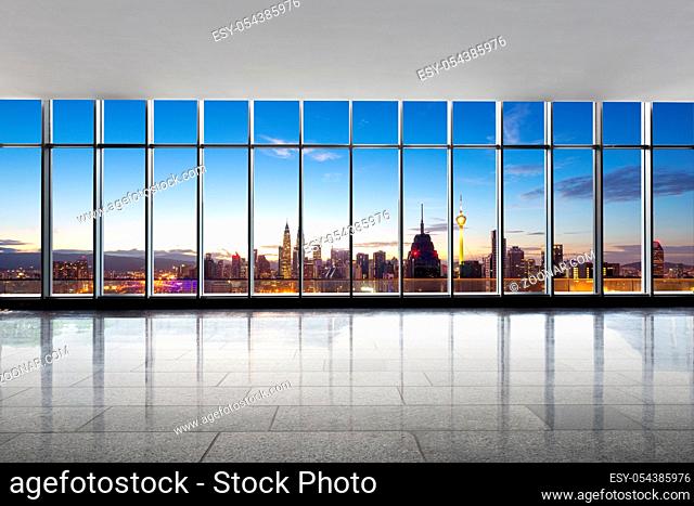 empty office and cityscape of kuala lumpur in cloud sky
