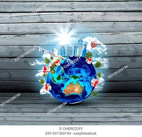 Earth with buildings and trees on old wooden surface. Elements of this image are furnished by NASA
