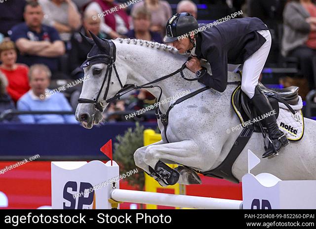 08 April 2022, Saxony, Leipzig: Markus Ehning from Germany competes on Calanda 42 in the Final II of the Longines Fei Jumping World Cup at the Leipzig Fair