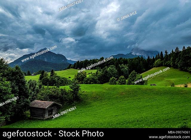 Mittenwald - Karwendel - alpine meadows under a dramatic sky