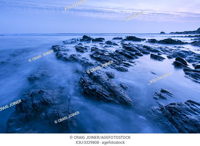 Rocks exposed by the retreating tide at Duckpool on the Hartland Heritage Coast, North Cornwall, England