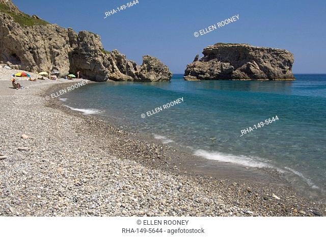 The pebble beach and emerald seas at Sougia on the south coast of Crete, Greek Islands, Greece, Europe