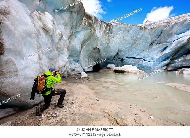 Photographing glacial cracks at the toe of the Darthmouth Glacier