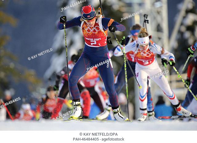 Tora Berger of Norway (C) in action during the 2x6km Women + 2x7.5 km Men Mixed Relay competition in Laura Cross-country Ski & Biathlon Center at the Sochi 2014...