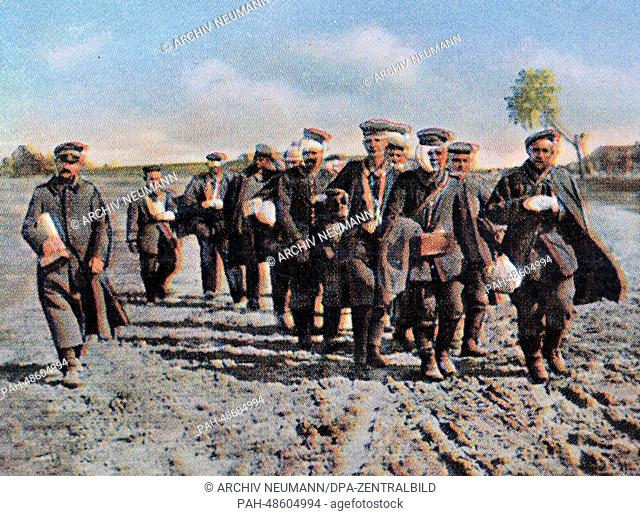 A contemporary German colorized propaganda photo shows German soldiers with minor injuries, date and location unknown (1914-1918)