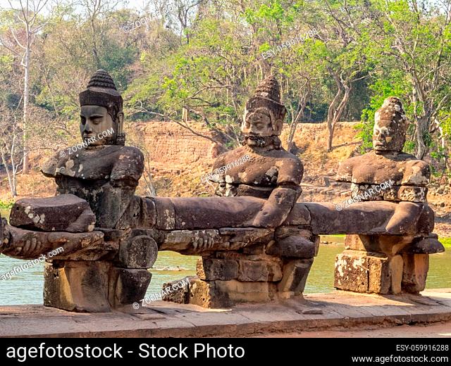 Statues of gods at the South Gate of Angkor Thom - Siem Reap, Cambodia