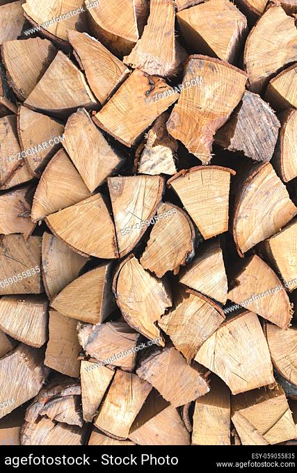Firewood background. Background of firewood dry and rough, cut in small pieces