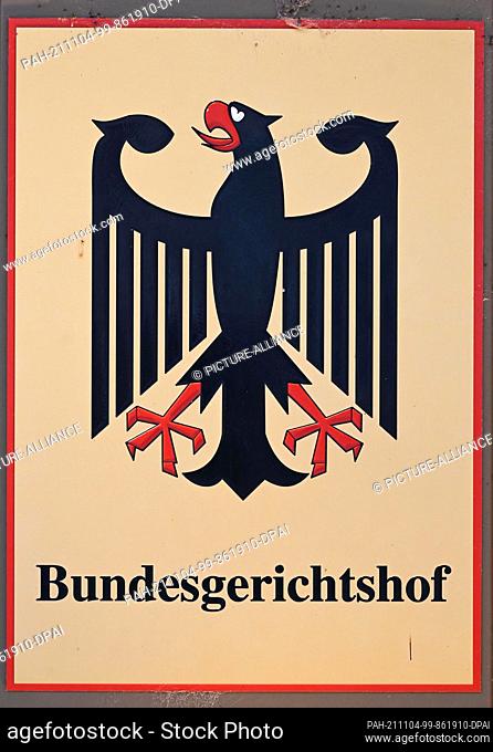 04 November 2021, Baden-Wuerttemberg, Karlsruhe: A sign with a federal eagle and the words ""Bundesgerichtshof"" (Federal Court of Justice)
