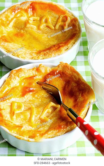 Pear pies and glasses of milk