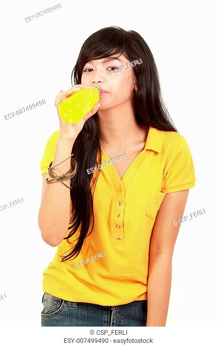 girl drinking orange juice