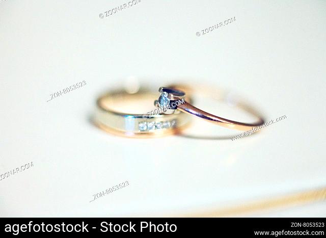 Two nice wedding rings. Love concept background