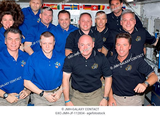 Inside the Kibo lab onboard the International Space Station (ISS), twelve astronauts and cosmonauts making up the STS-134 Endeavour and ISS Expedition 27 crews...