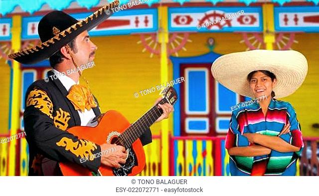 Mexican mariachi charro man and poncho Mexico girl